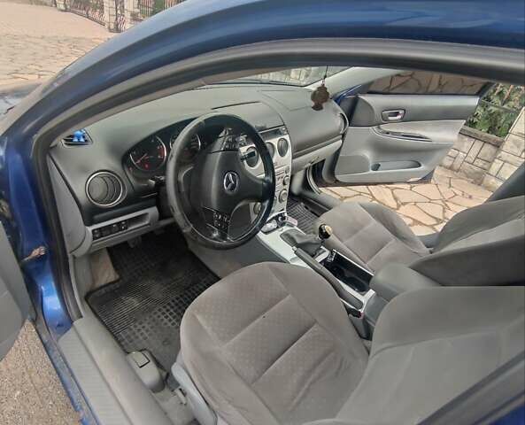 Синий Мазда 6, объемом двигателя 2 л и пробегом 310 тыс. км за 2800 $, фото 3 на Automoto.ua