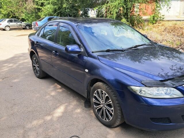 Синий Мазда 6, объемом двигателя 2 л и пробегом 200 тыс. км за 4100 $, фото 2 на Automoto.ua