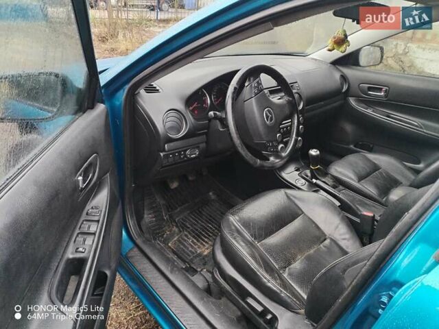 Синий Мазда 6, объемом двигателя 2 л и пробегом 340 тыс. км за 3700 $, фото 10 на Automoto.ua