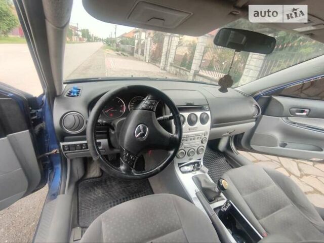 Синий Мазда 6, объемом двигателя 2 л и пробегом 310 тыс. км за 2800 $, фото 2 на Automoto.ua