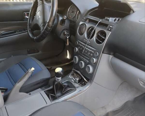 Синий Мазда 6, объемом двигателя 0 л и пробегом 450 тыс. км за 3650 $, фото 2 на Automoto.ua