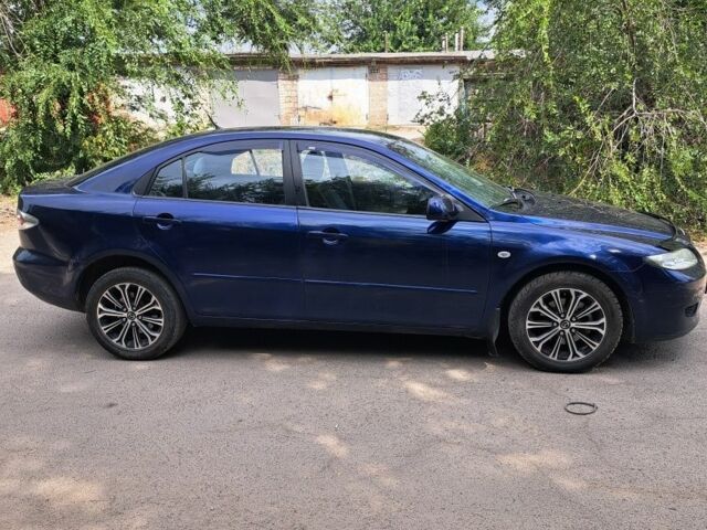 Синий Мазда 6, объемом двигателя 2 л и пробегом 200 тыс. км за 4100 $, фото 4 на Automoto.ua