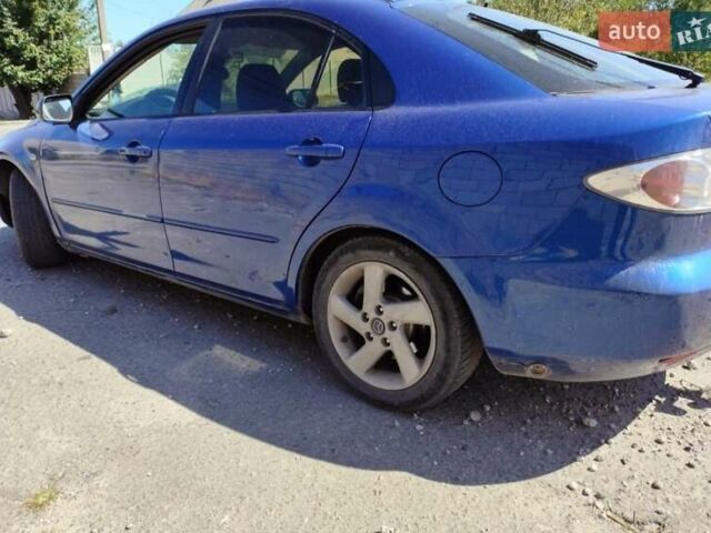 Синий Мазда 6, объемом двигателя 2 л и пробегом 257 тыс. км за 3300 $, фото 11 на Automoto.ua