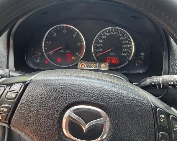 Синій Мазда 6, об'ємом двигуна 2 л та пробігом 200 тис. км за 4700 $, фото 4 на Automoto.ua