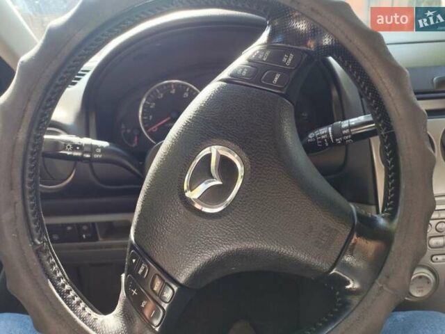 Синий Мазда 6, объемом двигателя 2 л и пробегом 257 тыс. км за 3300 $, фото 22 на Automoto.ua