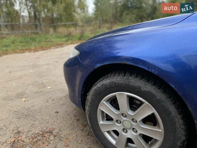 Синий Мазда 6, объемом двигателя 2 л и пробегом 250 тыс. км за 2950 $, фото 10 на Automoto.ua