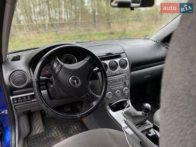 Синий Мазда 6, объемом двигателя 2 л и пробегом 250 тыс. км за 2950 $, фото 9 на Automoto.ua