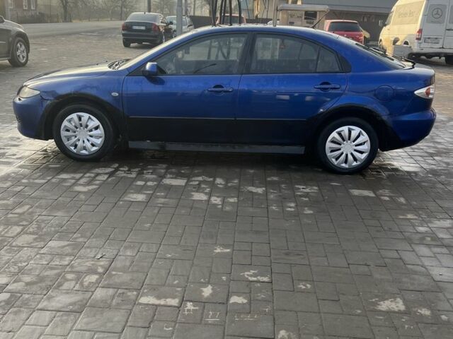 Синий Мазда 6, объемом двигателя 2 л и пробегом 280 тыс. км за 1500 $, фото 4 на Automoto.ua