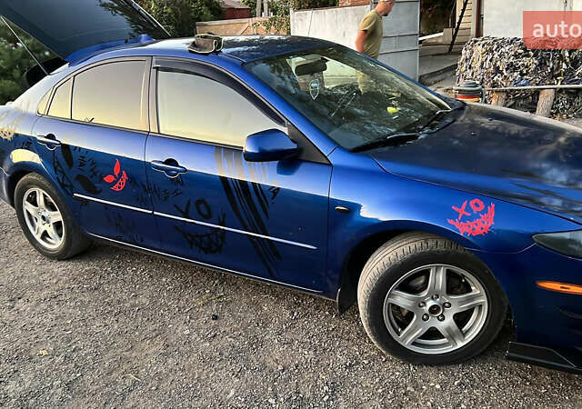 Синий Мазда 6, объемом двигателя 2 л и пробегом 400 тыс. км за 4700 $, фото 3 на Automoto.ua