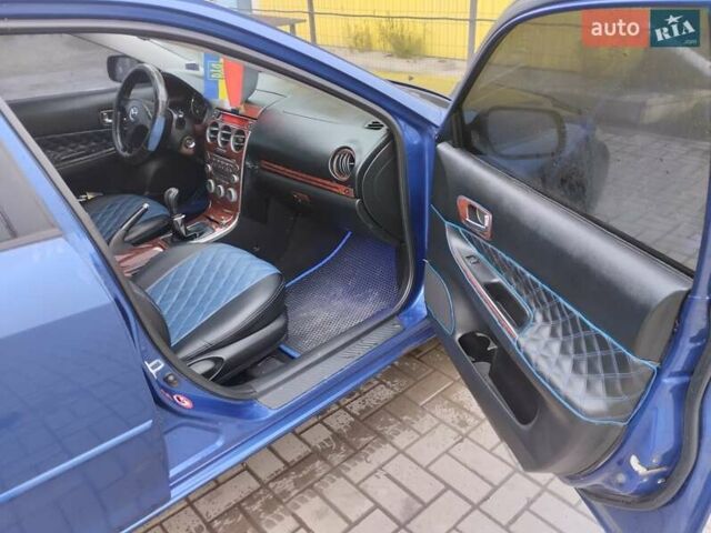 Синій Мазда 6, об'ємом двигуна 2 л та пробігом 280 тис. км за 3500 $, фото 4 на Automoto.ua