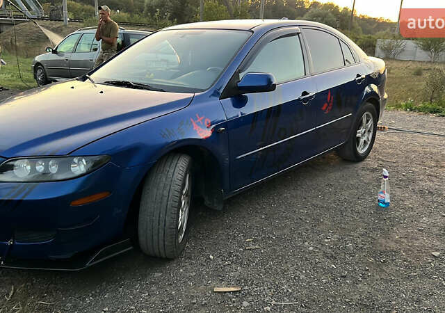Синий Мазда 6, объемом двигателя 2 л и пробегом 400 тыс. км за 4700 $, фото 9 на Automoto.ua