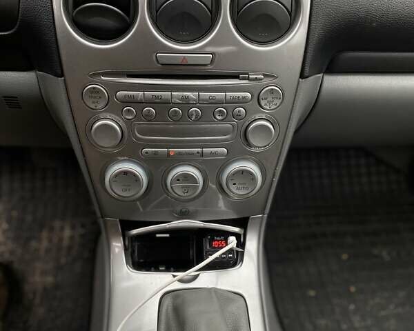 Синий Мазда 6, объемом двигателя 2 л и пробегом 250 тыс. км за 2950 $, фото 5 на Automoto.ua