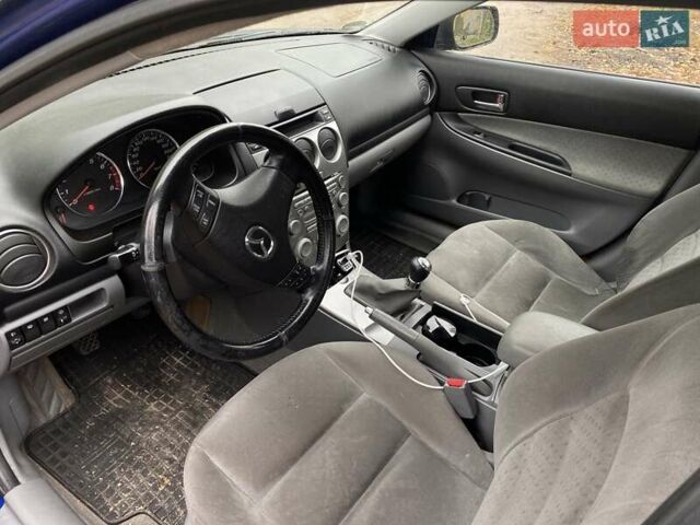 Синий Мазда 6, объемом двигателя 2 л и пробегом 250 тыс. км за 2950 $, фото 8 на Automoto.ua