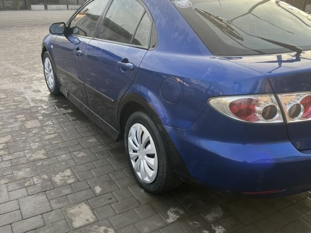 Синий Мазда 6, объемом двигателя 2 л и пробегом 280 тыс. км за 1500 $, фото 1 на Automoto.ua