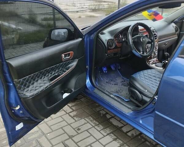 Синій Мазда 6, об'ємом двигуна 2 л та пробігом 280 тис. км за 3500 $, фото 5 на Automoto.ua
