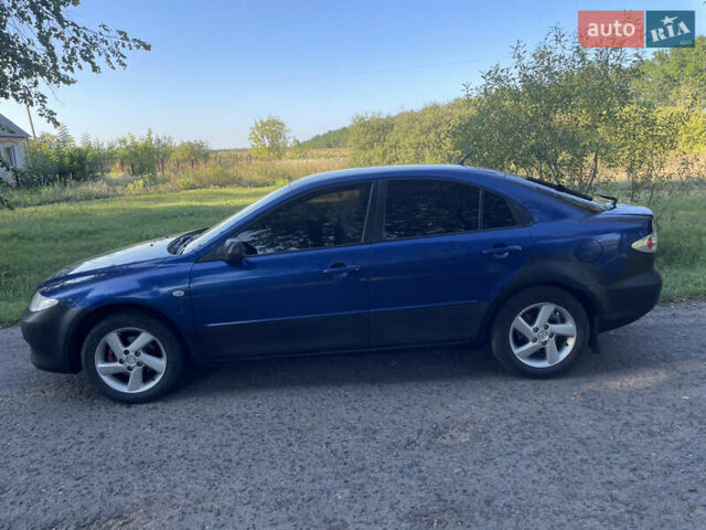 Синій Мазда 6, об'ємом двигуна 1.8 л та пробігом 345 тис. км за 4000 $, фото 5 на Automoto.ua