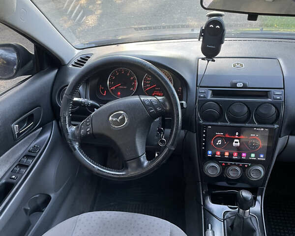 Синій Мазда 6, об'ємом двигуна 1.8 л та пробігом 345 тис. км за 4000 $, фото 9 на Automoto.ua