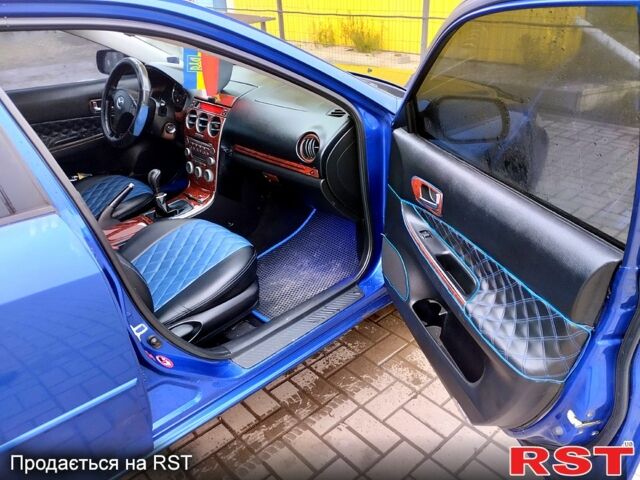 Синій Мазда 6, об'ємом двигуна 2 л та пробігом 280 тис. км за 3500 $, фото 7 на Automoto.ua