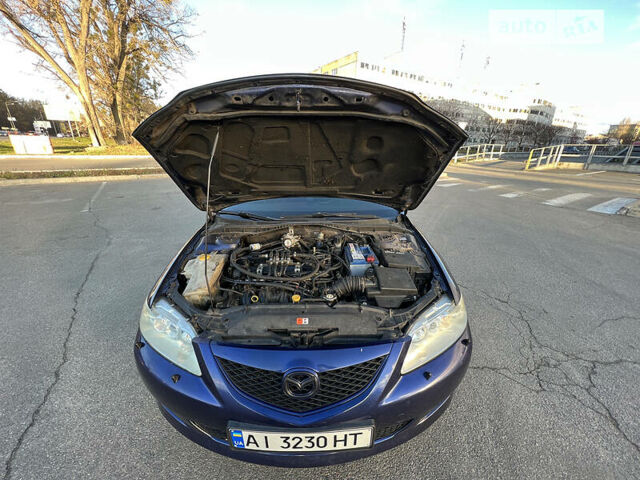 Синий Мазда 6, объемом двигателя 2.3 л и пробегом 291 тыс. км за 3950 $, фото 5 на Automoto.ua