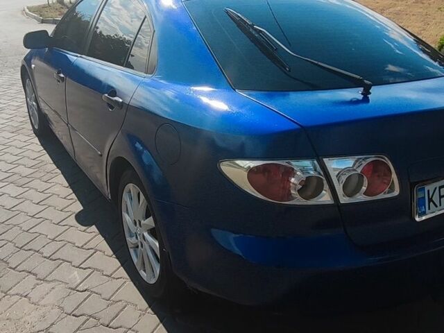 Синий Мазда 6, объемом двигателя 2 л и пробегом 270 тыс. км за 4100 $, фото 2 на Automoto.ua
