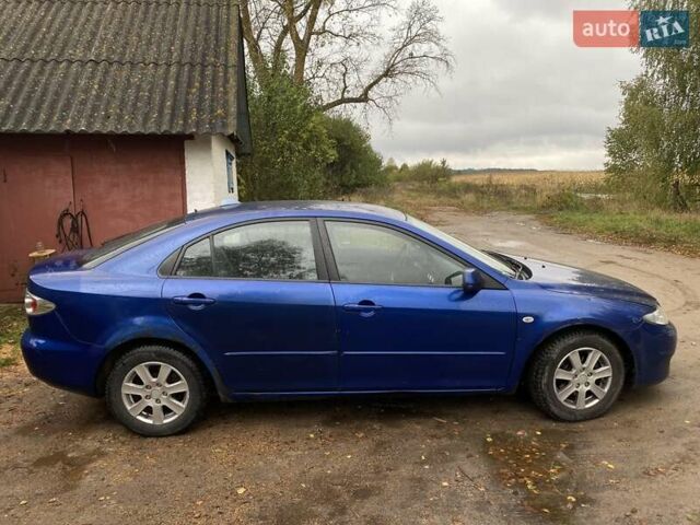 Синий Мазда 6, объемом двигателя 2 л и пробегом 250 тыс. км за 2950 $, фото 12 на Automoto.ua