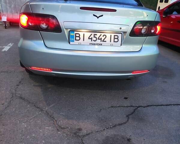 Синий Мазда 6, объемом двигателя 2 л и пробегом 300 тыс. км за 5500 $, фото 3 на Automoto.ua