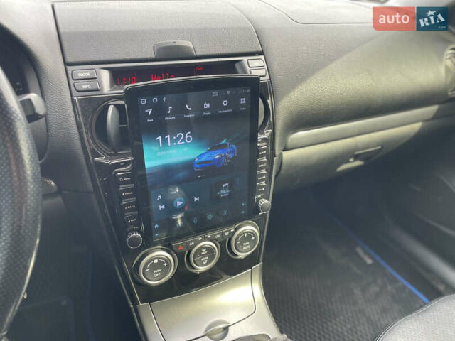 Синий Мазда 6, объемом двигателя 2 л и пробегом 331 тыс. км за 4199 $, фото 17 на Automoto.ua
