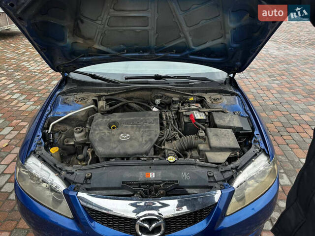 Синий Мазда 6, объемом двигателя 1.8 л и пробегом 268 тыс. км за 4600 $, фото 27 на Automoto.ua