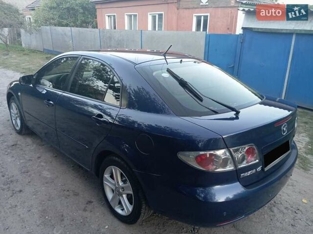 Синій Мазда 6, об'ємом двигуна 2 л та пробігом 200 тис. км за 4000 $, фото 4 на Automoto.ua