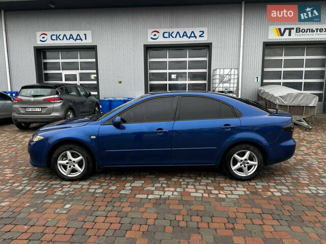 Синий Мазда 6, объемом двигателя 1.8 л и пробегом 268 тыс. км за 4600 $, фото 2 на Automoto.ua