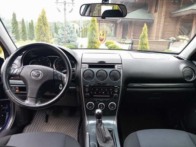 Синий Мазда 6, объемом двигателя 2 л и пробегом 300 тыс. км за 3900 $, фото 4 на Automoto.ua