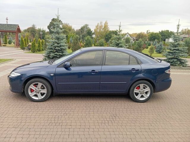Синий Мазда 6, объемом двигателя 2 л и пробегом 300 тыс. км за 3900 $, фото 1 на Automoto.ua