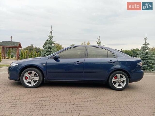 Синий Мазда 6, объемом двигателя 2 л и пробегом 300 тыс. км за 3900 $, фото 5 на Automoto.ua