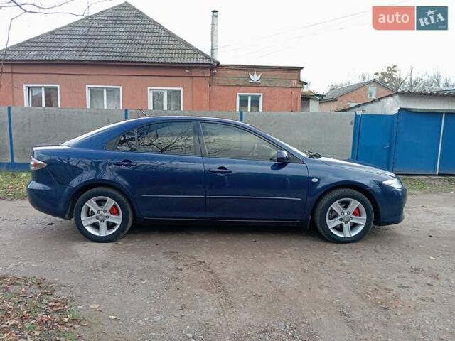 Синій Мазда 6, об'ємом двигуна 2 л та пробігом 300 тис. км за 3800 $, фото 6 на Automoto.ua