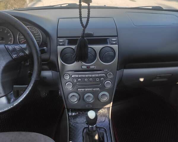 Синий Мазда 6, объемом двигателя 2 л и пробегом 300 тыс. км за 5500 $, фото 11 на Automoto.ua