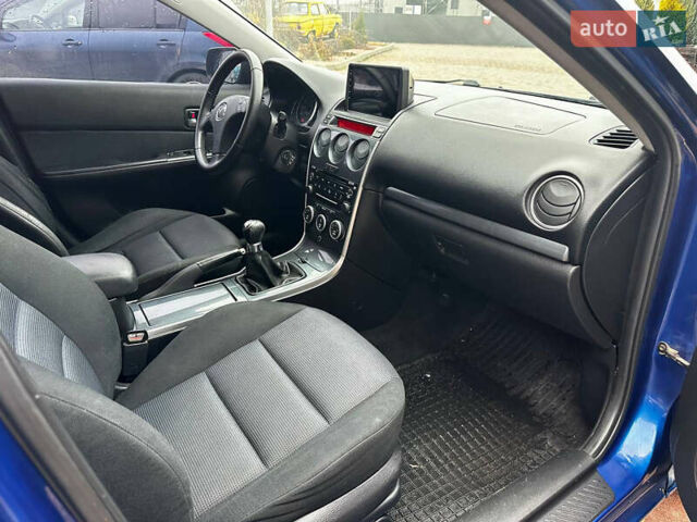 Синий Мазда 6, объемом двигателя 1.8 л и пробегом 268 тыс. км за 4600 $, фото 19 на Automoto.ua