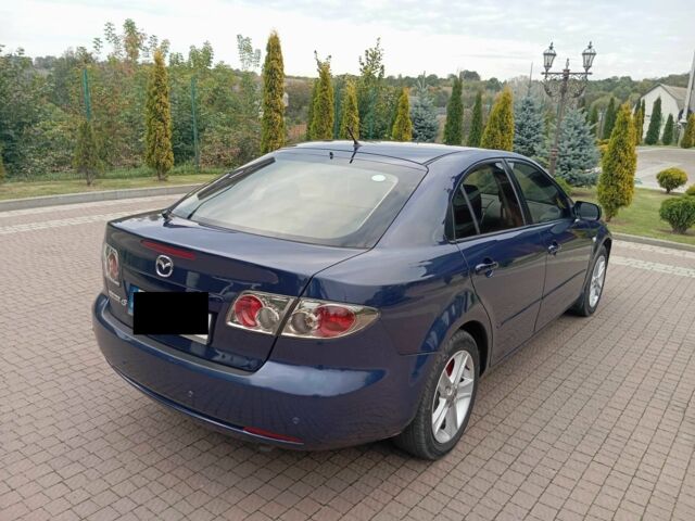 Синий Мазда 6, объемом двигателя 2 л и пробегом 300 тыс. км за 3900 $, фото 2 на Automoto.ua
