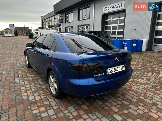 Синий Мазда 6, объемом двигателя 1.8 л и пробегом 268 тыс. км за 4600 $, фото 4 на Automoto.ua