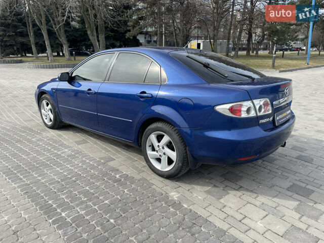Синий Мазда 6, объемом двигателя 2 л и пробегом 331 тыс. км за 4199 $, фото 4 на Automoto.ua