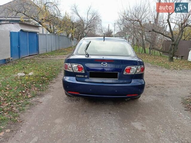 Синій Мазда 6, об'ємом двигуна 2 л та пробігом 300 тис. км за 3800 $, фото 4 на Automoto.ua