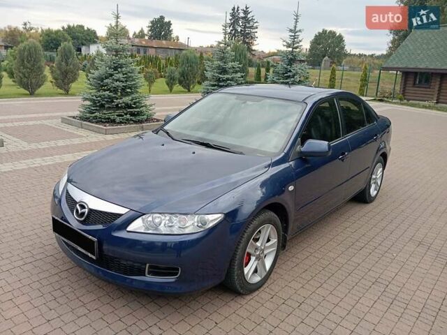 Синий Мазда 6, объемом двигателя 2 л и пробегом 300 тыс. км за 3900 $, фото 2 на Automoto.ua