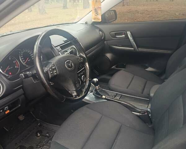 Синій Мазда 6, об'ємом двигуна 2 л та пробігом 337 тис. км за 3800 $, фото 4 на Automoto.ua