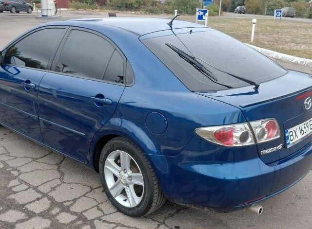 Синий Мазда 6, объемом двигателя 2 л и пробегом 168 тыс. км за 3300 $, фото 2 на Automoto.ua