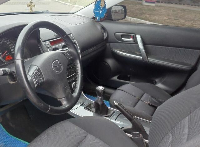 Синий Мазда 6, объемом двигателя 2 л и пробегом 168 тыс. км за 3300 $, фото 3 на Automoto.ua