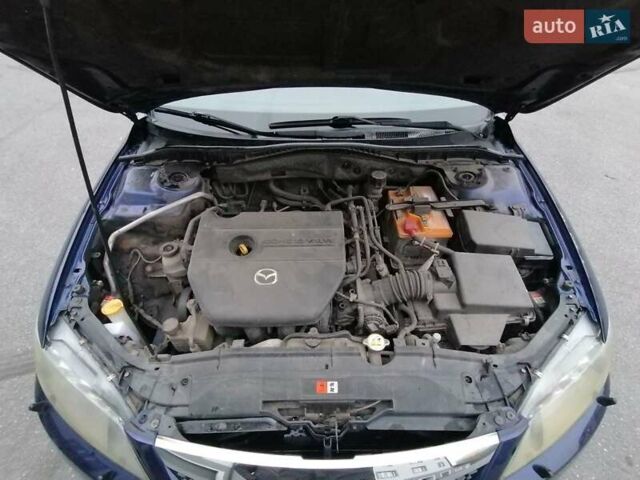 Синий Мазда 6, объемом двигателя 1.8 л и пробегом 205 тыс. км за 4800 $, фото 9 на Automoto.ua