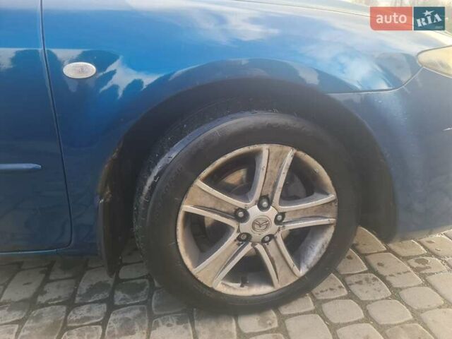 Синий Мазда 6, объемом двигателя 2 л и пробегом 338 тыс. км за 3500 $, фото 3 на Automoto.ua