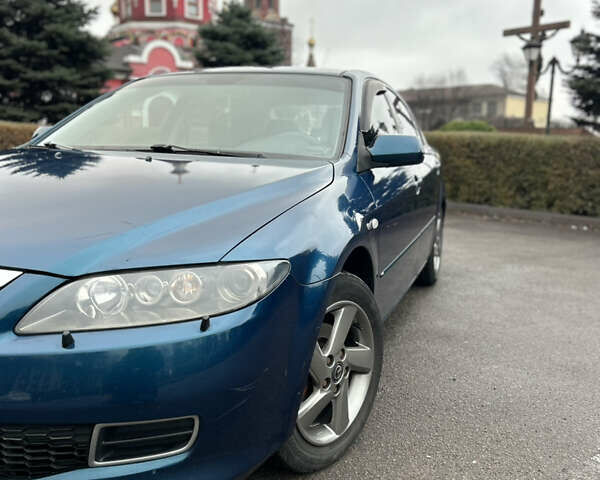 Синий Мазда 6, объемом двигателя 2 л и пробегом 177 тыс. км за 5500 $, фото 5 на Automoto.ua