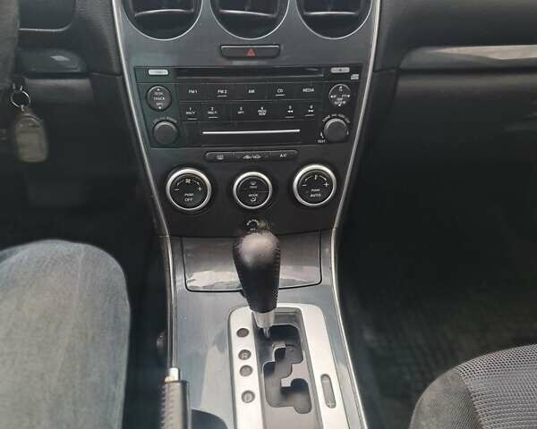 Синий Мазда 6, объемом двигателя 2 л и пробегом 338 тыс. км за 3500 $, фото 27 на Automoto.ua