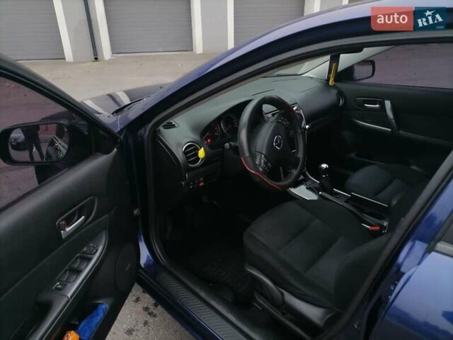 Синий Мазда 6, объемом двигателя 1.8 л и пробегом 205 тыс. км за 4800 $, фото 3 на Automoto.ua