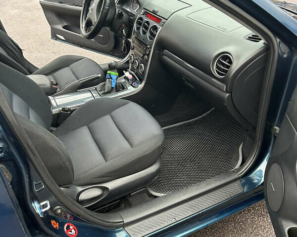 Синий Мазда 6, объемом двигателя 2 л и пробегом 177 тыс. км за 5500 $, фото 12 на Automoto.ua